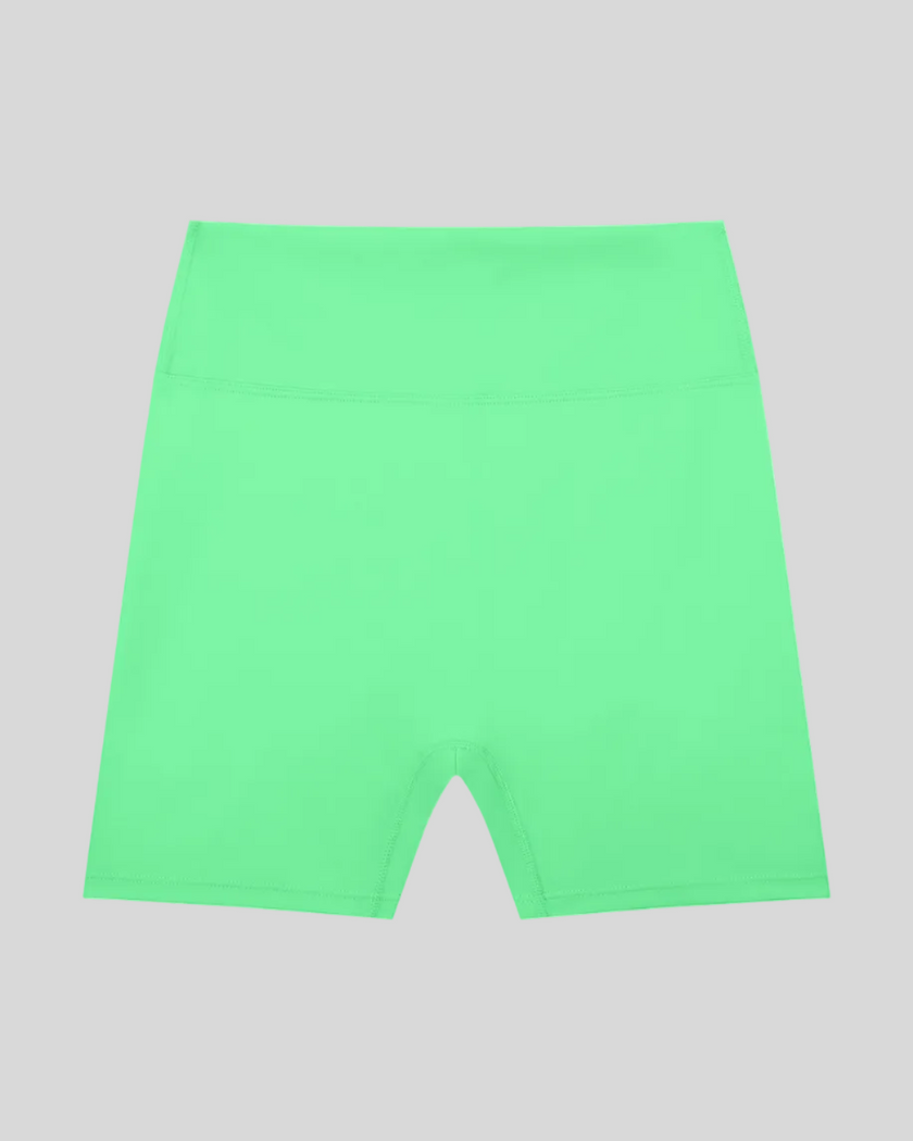 CoreLine Biker Shorts in green, flatlay front view