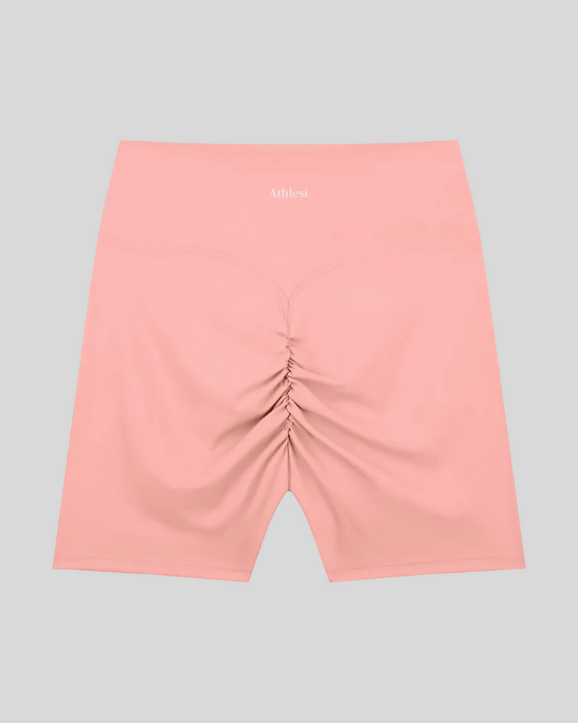 CoreLine Biker Shorts in pink, flatlay back view