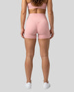 CoreLine Biker Shorts in pink, back view styled on model