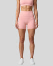 CoreLine Biker Shorts in pink, front view styled on model