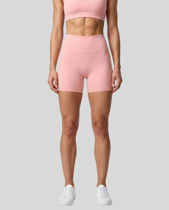 CoreLine Biker Shorts in pink, front view styled on model