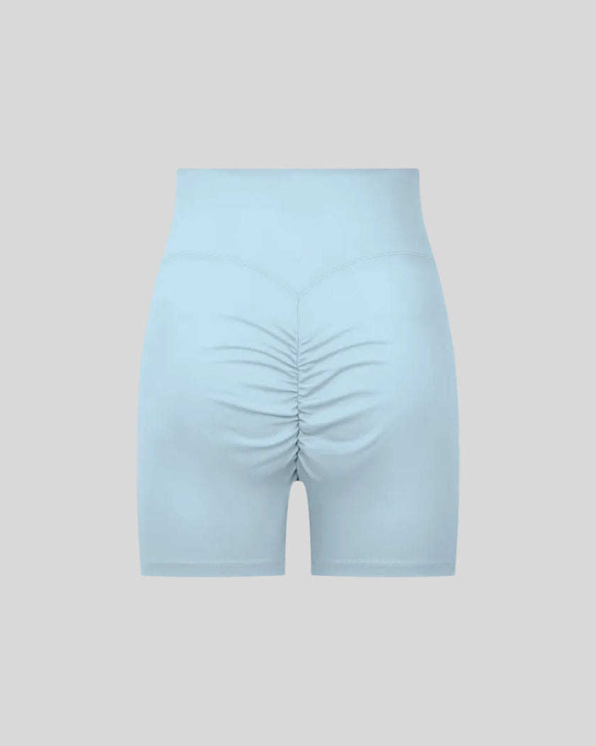 CoreLine Biker Shorts in sky blue, 3D back view with contour detail