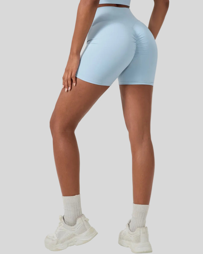 CoreLine Biker Shorts in sky blue, back left angle view