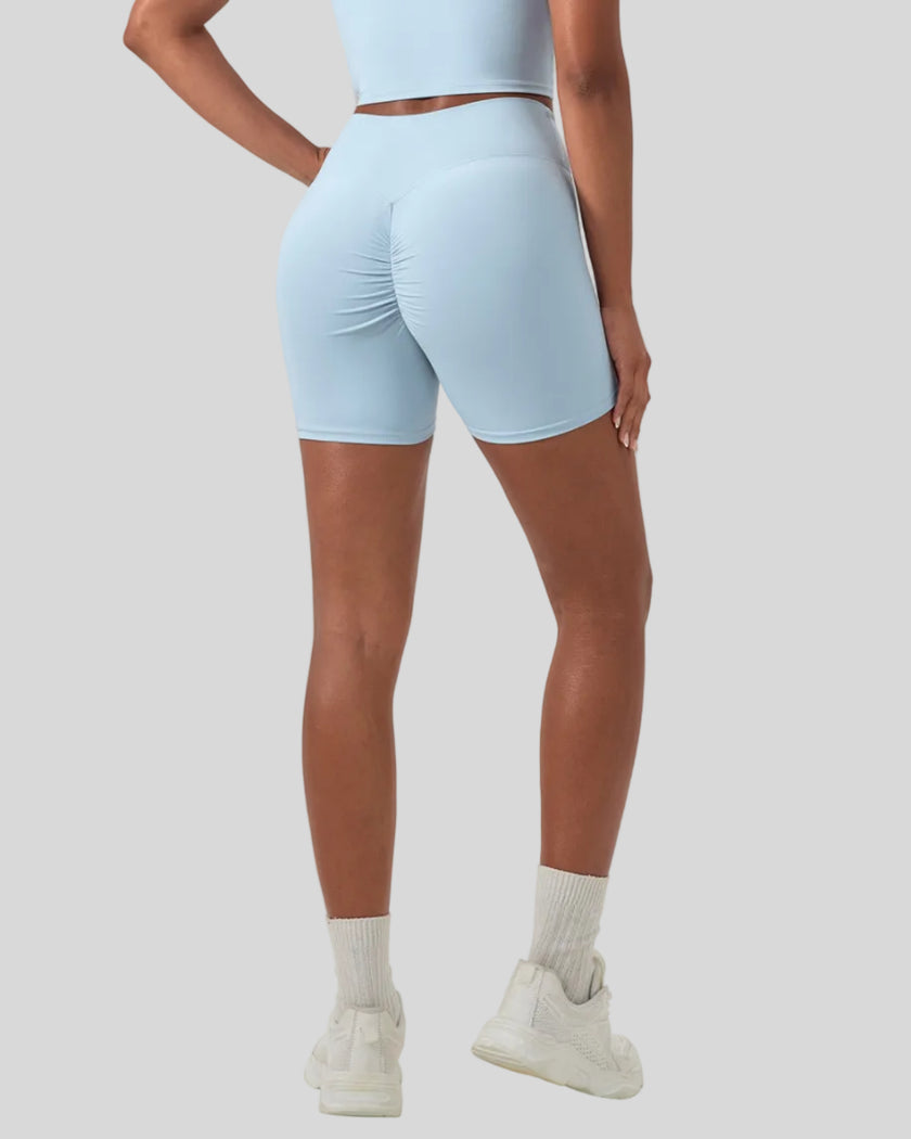 CoreLine Biker Shorts in sky blue, back right angle view