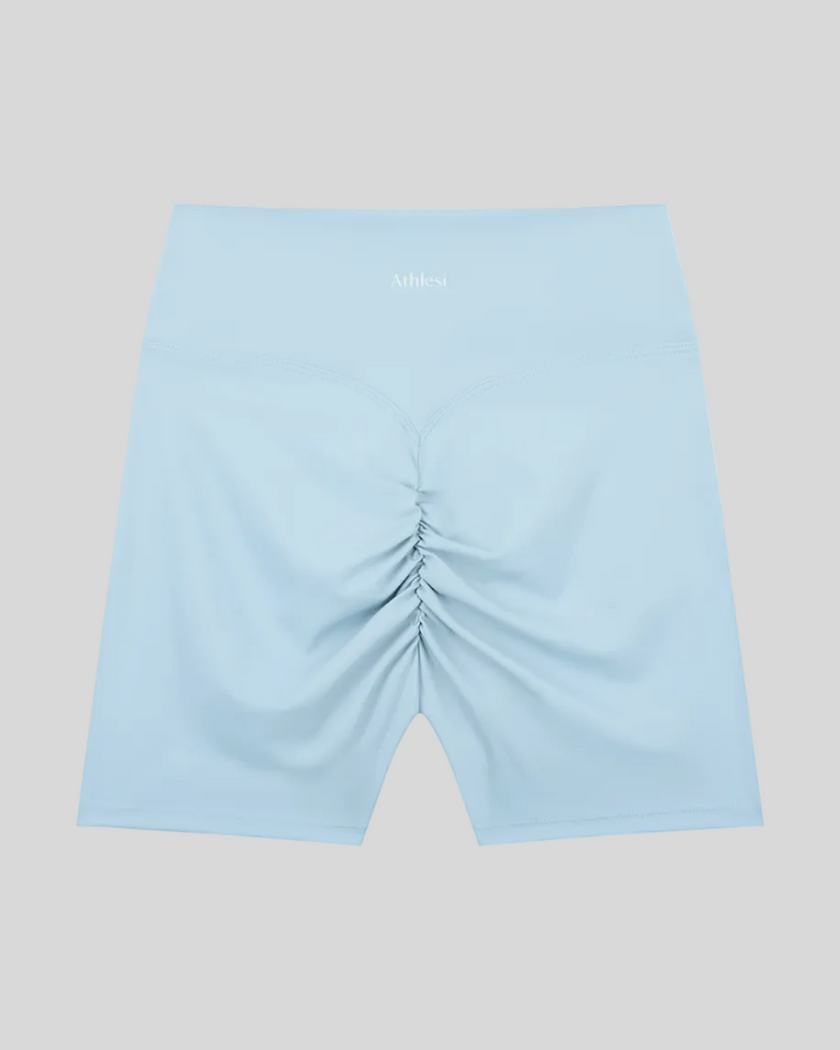 CoreLine Biker Shorts in sky blue, flatlay back view