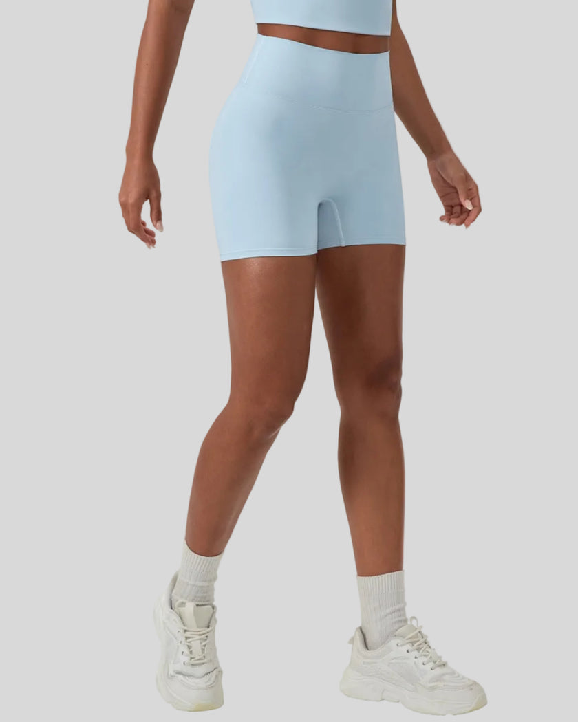 CoreLine Biker Shorts in sky blue, angled front view showing fit