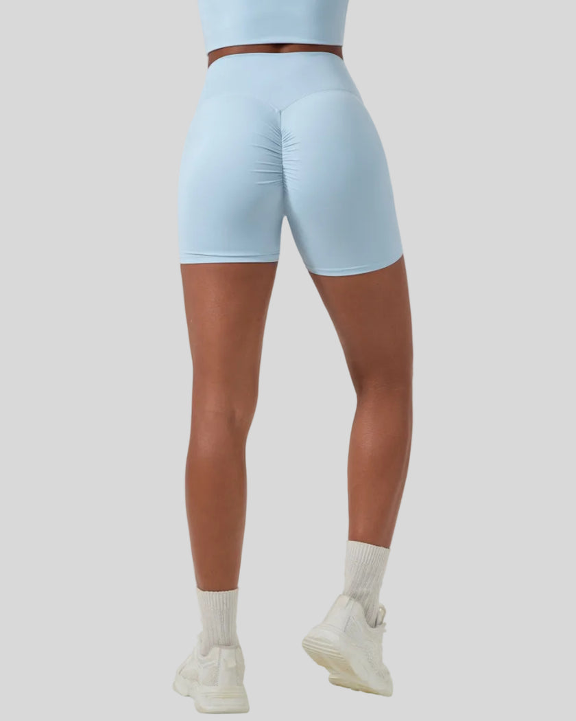 CoreLine Biker Shorts in sky blue, lower body back view