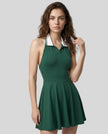 Model wearing blackish green Athlesi CoreLine court dress front