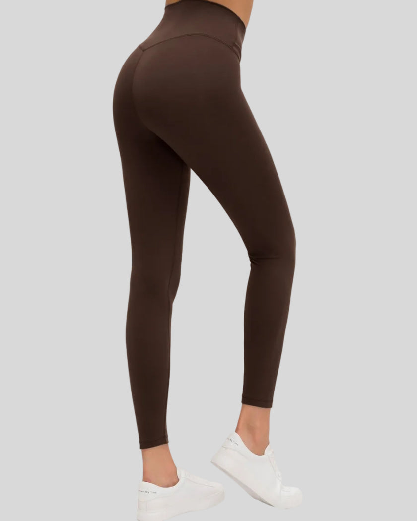 CoreLine High-Waisted Leggings in brown, angled back view