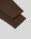 CoreLine High-Waisted Leggings in brown, leg hem detail close-up