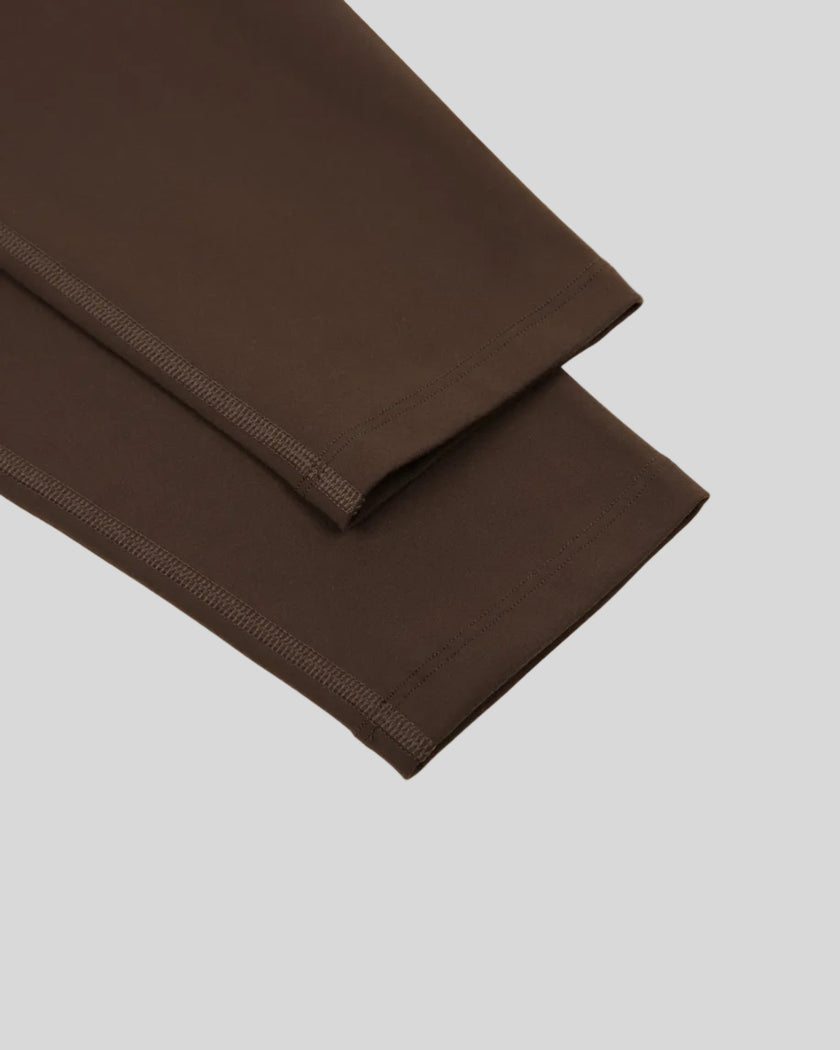 CoreLine High-Waisted Leggings in brown, leg hem detail close-up