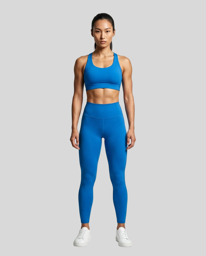 CoreLine High-Waisted Leggings in colorful blue, full body front view styled on model