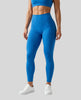 CoreLine High-Waisted Leggings in colorful blue, front view styled on model