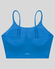 CoreLine Sports Bra in colorful blue, 3D back view with clean minimal structure