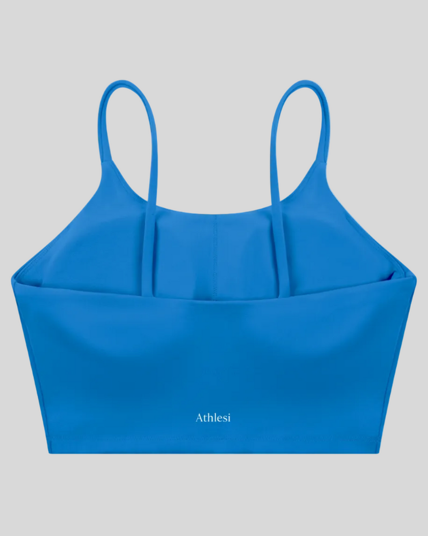 CoreLine Sports Bra in colorful blue, 3D back view with clean minimal structure
