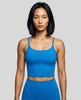 CoreLine Sports Bra in colorful blue, front view styled on model