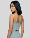 CoreLine Sports Bra in haze blue, angled back view showing contour fit