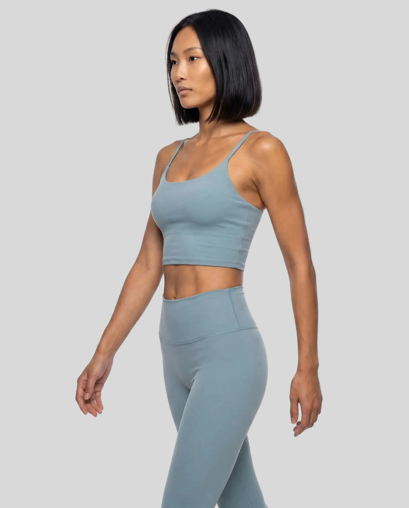 CoreLine Sports Bra in haze blue, angled front view showing contour fit