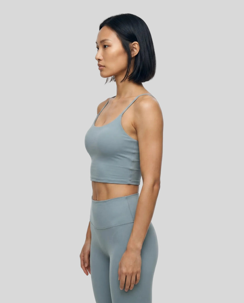 CoreLine Sports Bra in haze blue, side view highlighting thin straps and fit