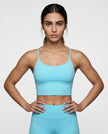 CoreLine Sports Bra in lake blue, front view styled on model