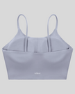 CoreLine Sports Bra in light purple, 3D back view with clean minimal structure