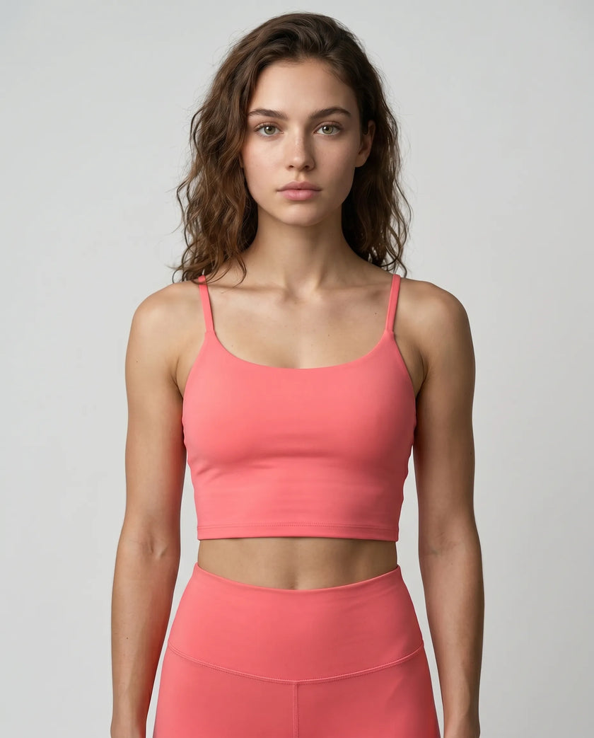 CoreLine Sports Bra in rose pink, front view styled on model