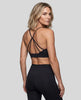 CoreLine Studio Sports Bra in black, upper body angled back view