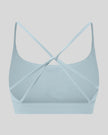 CoreLine Studio Sports Bra in light blue, 3D back view with strappy design