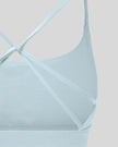 CoreLine Studio Sports Bra in light blue, back strap detail close-up
