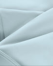 CoreLine Studio Sports Bra in light blue, fabric texture close-up