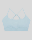 CoreLine Studio Sports Bra in light blue, flatlay front view with scoop neckline