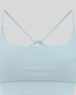 CoreLine Studio Sports Bra in light blue, front detail close-up