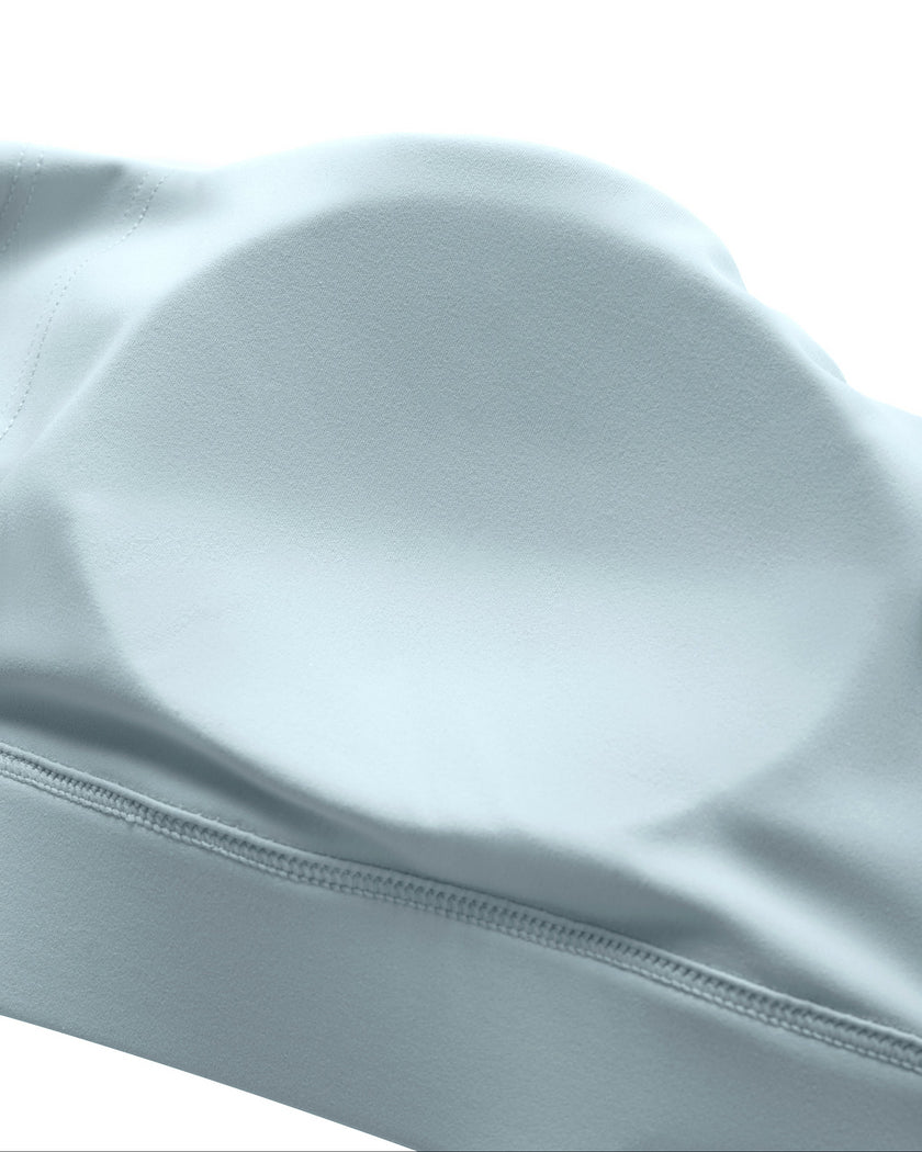 CoreLine Studio Sports Bra in light blue, chest padding detail close-up