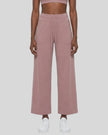 Model wearing CoreLine Yoga Pants in Cameo front view