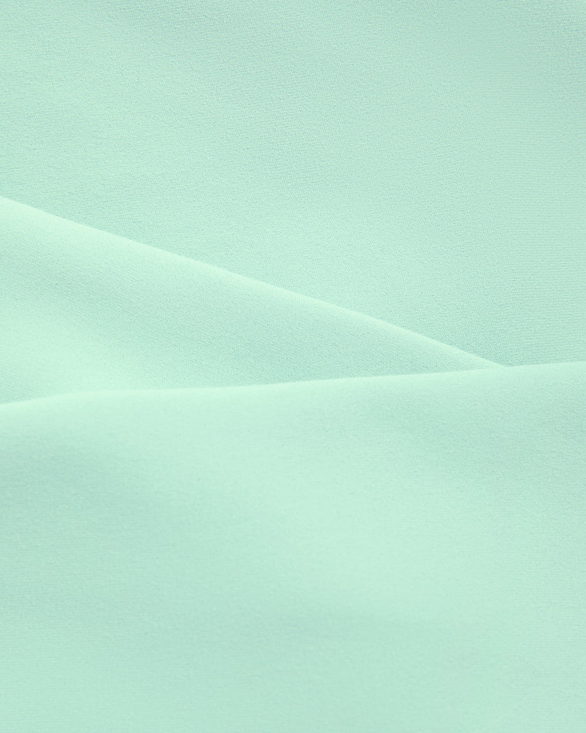 Fabric texture detail of CoreLine Yoga Sports Bra in Mint Green
