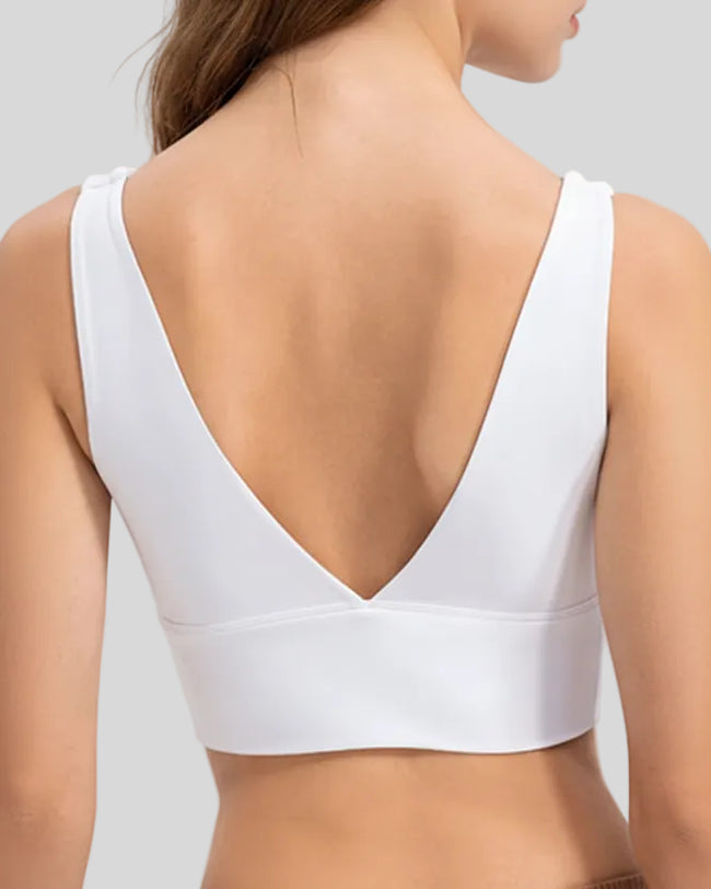 Back view of Athlesi CoreSculpt seamless active tank in white with deep V-back