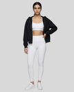 CoreZip Hooded Jacket in black worn by model full body front view styled in a neutral setting