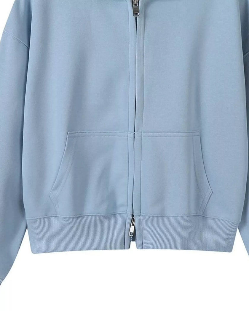 CoreZip Hooded Jacket in blue close-up showing front zipper detail