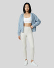 CoreZip Hooded Jacket in blue worn by model full body front view styled in a neutral setting
