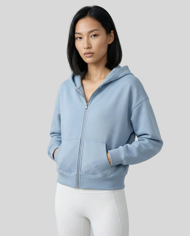 CoreZip Hooded Jacket in blue worn by model mid body front view highlighting fit and structure