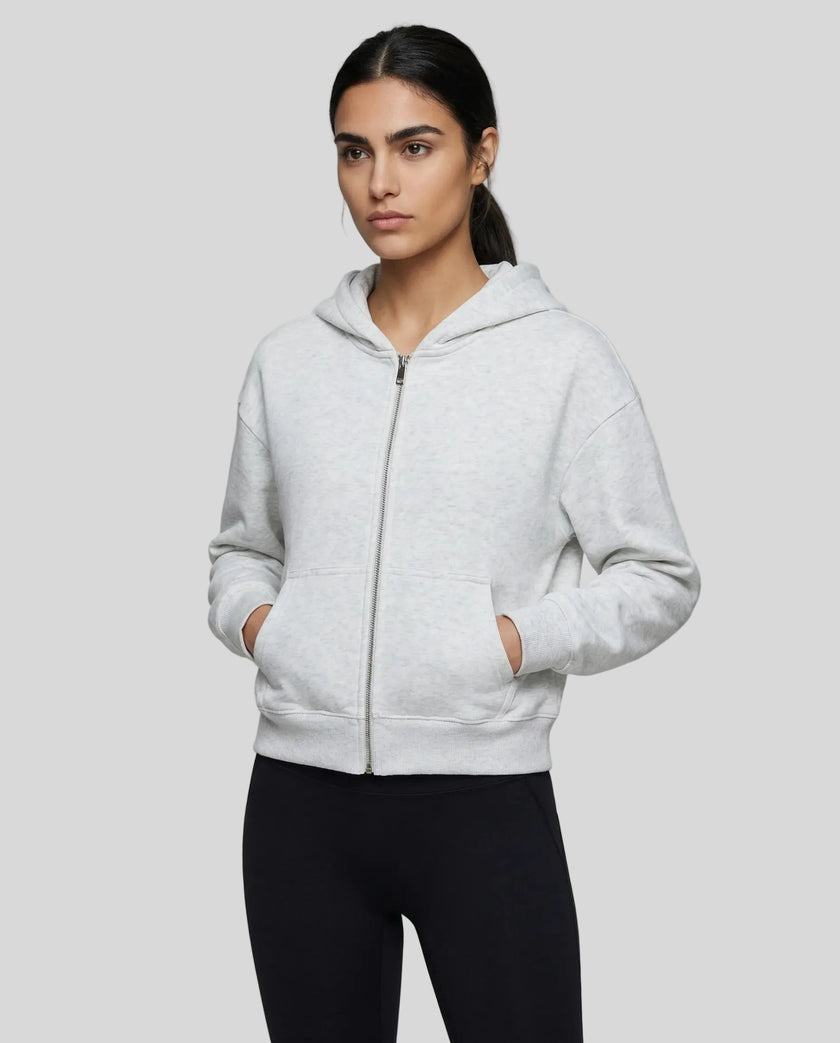 CoreZip Hooded Jacket in light gray worn by model mid body front view highlighting fit and structure