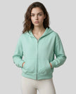 CoreZip Hooded Jacket in light green worn by model mid body front view highlighting fit and structure