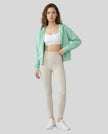 CoreZip Hooded Jacket in light green worn by model full body front view styled in a neutral setting