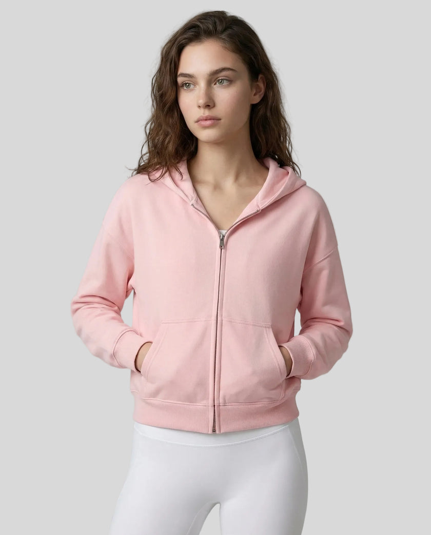 CoreZip Hooded Jacket in pink worn by model mid body front view highlighting fit and structure