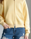 CoreZip Hooded Jacket in [color] close-up showing sleeve and zipper detail