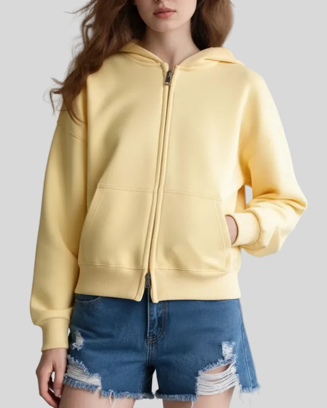CoreZip Hooded Jacket in yellow front closed view showing clean silhouette and zip closure