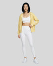 CoreZip Hooded Jacket in yellow worn by model full body front view styled in a neutral setting