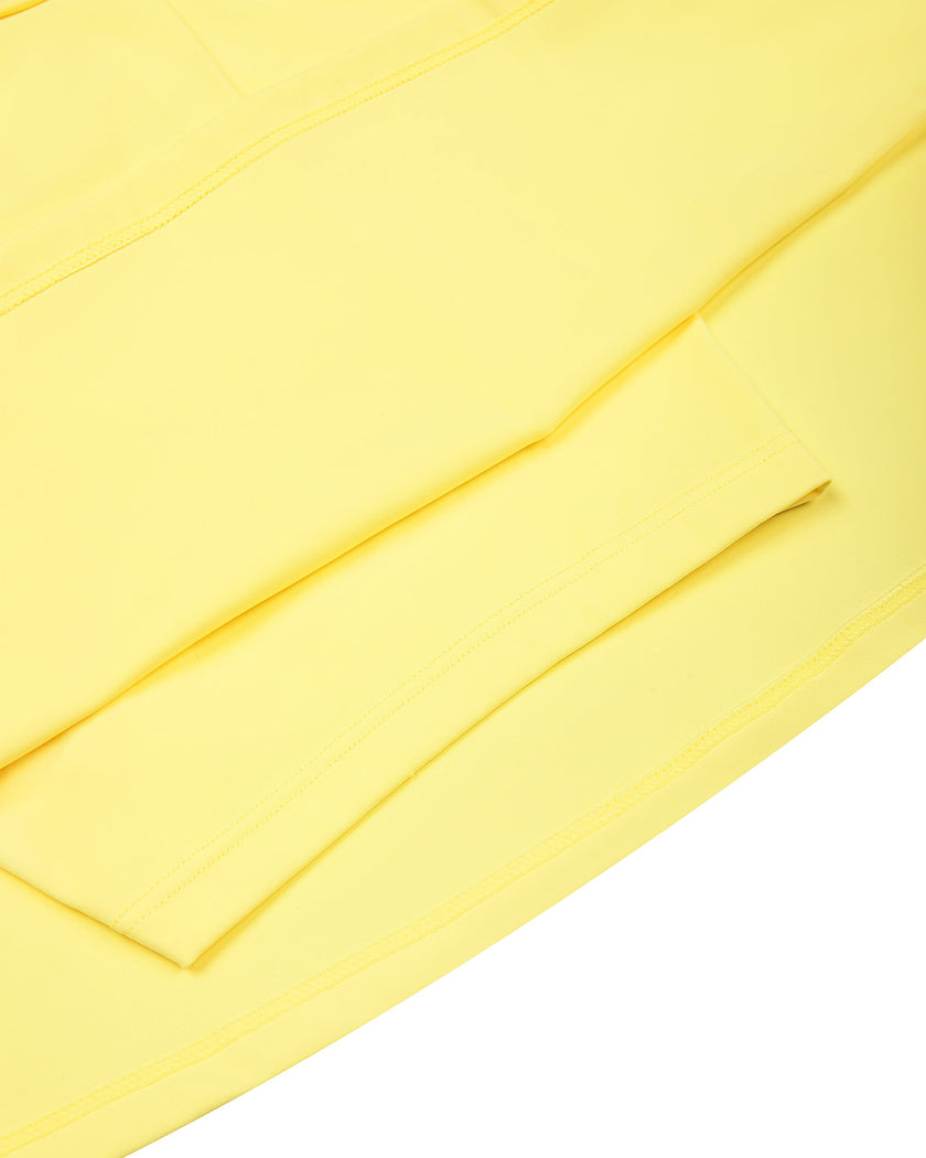 Close-up of the built-in shorts inside the CourtClub A-Line Skirt in Yellow.