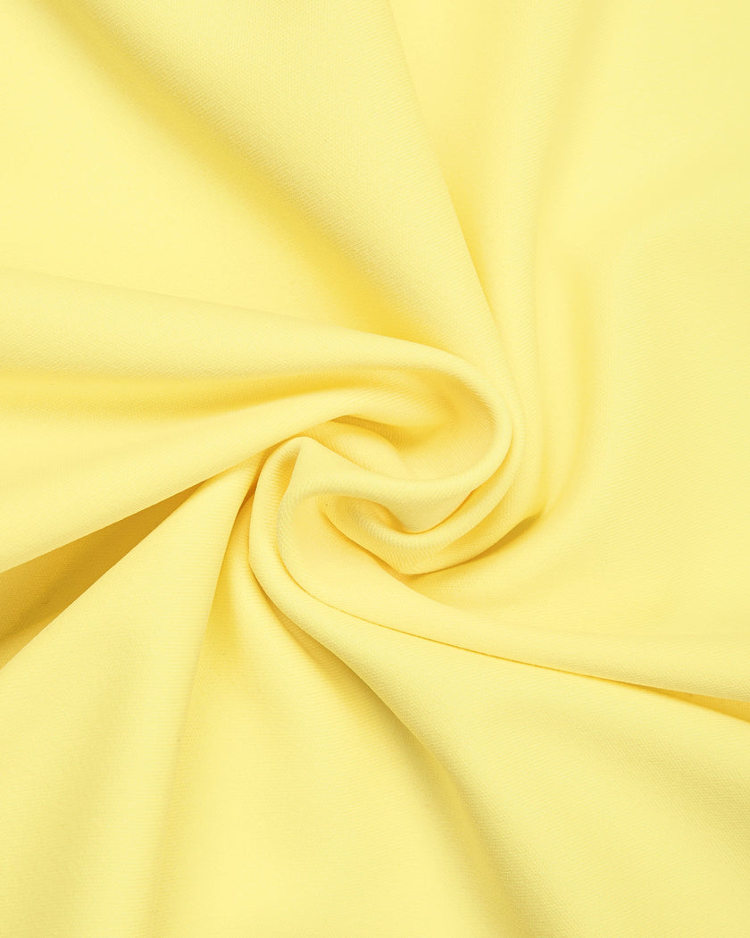 Detailed view of the premium knit fabric texture on the CourtClub A-Line Skirt in Yellow.