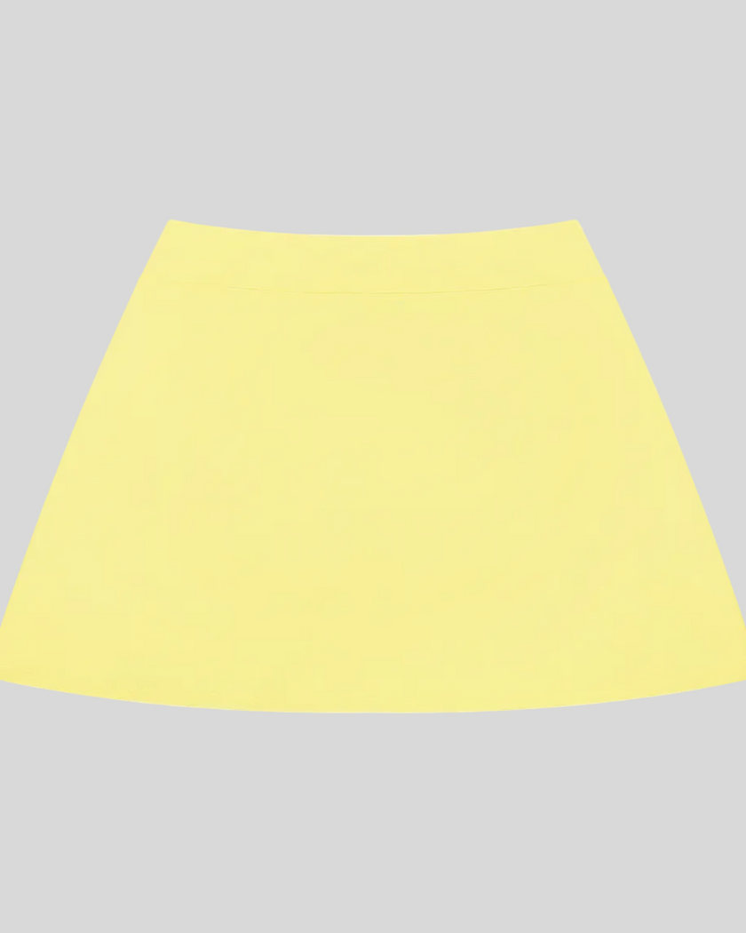 CourtClub A-Line Skirt in Yellow front view featuring a flattering high-rise waistband and flowing silhouette.